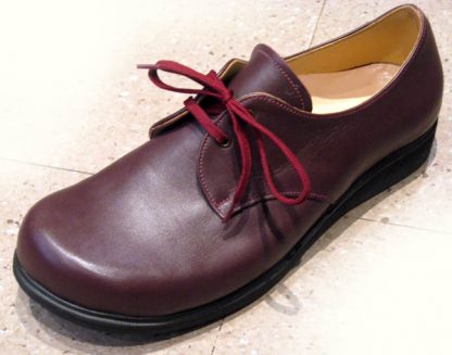 Burgundy foot shaped derby shoes