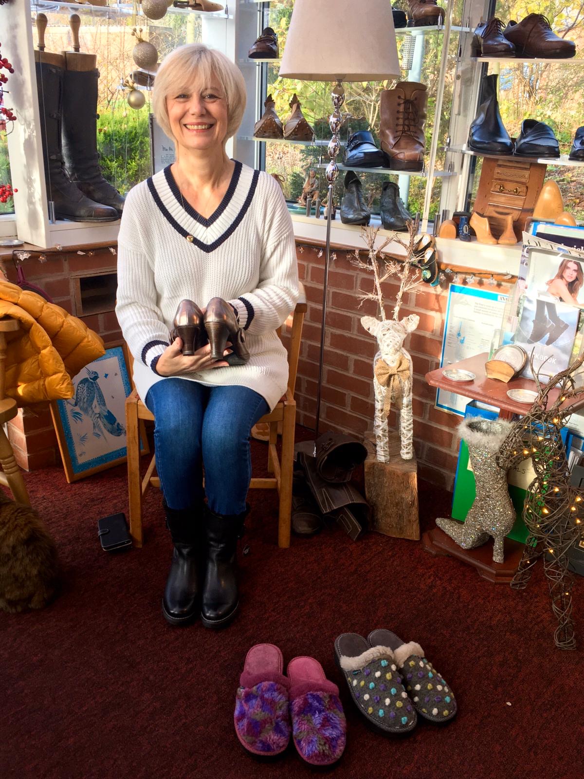 Carole Arnold has her shoes fitted at Bill Bird Shoes in the Cotswolds